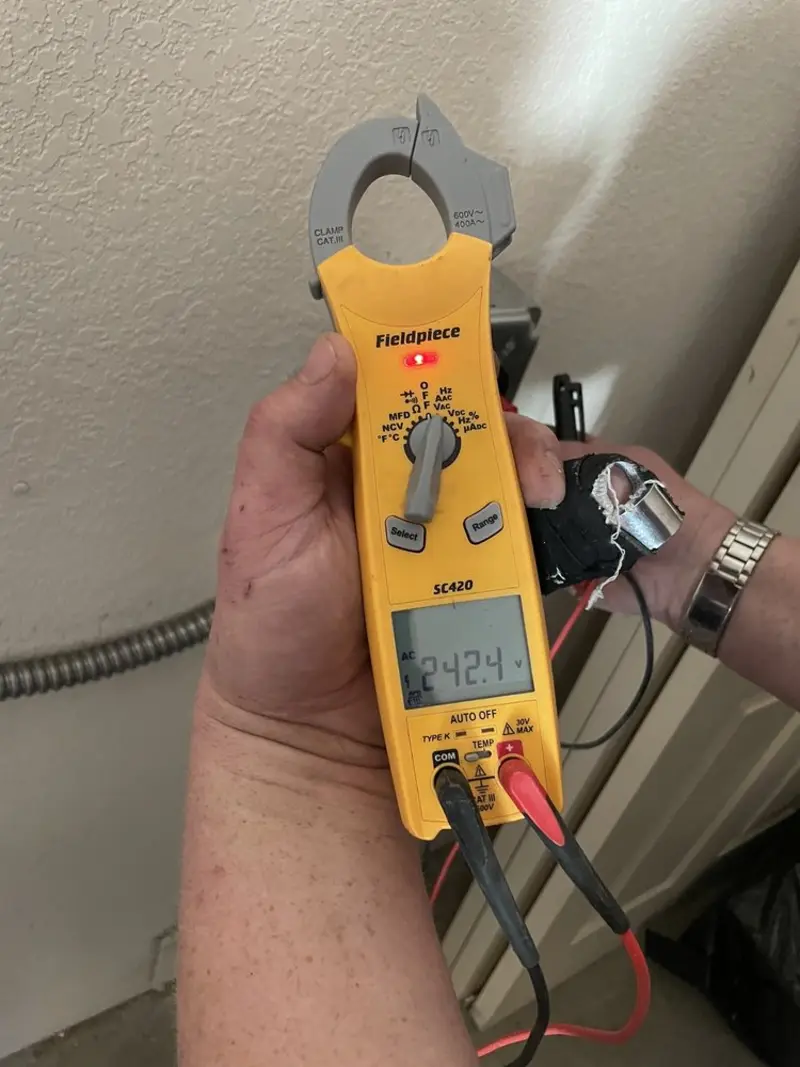 Voltage testing with clamp meter during Circuit Breaker Repair in Columbia